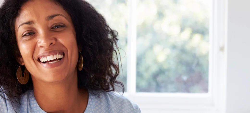 A smiling woman thankful for her egg donor.
