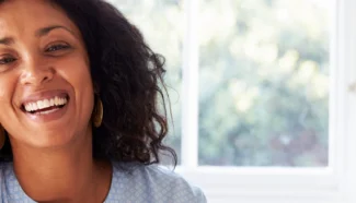 A smiling woman thankful for her egg donor.