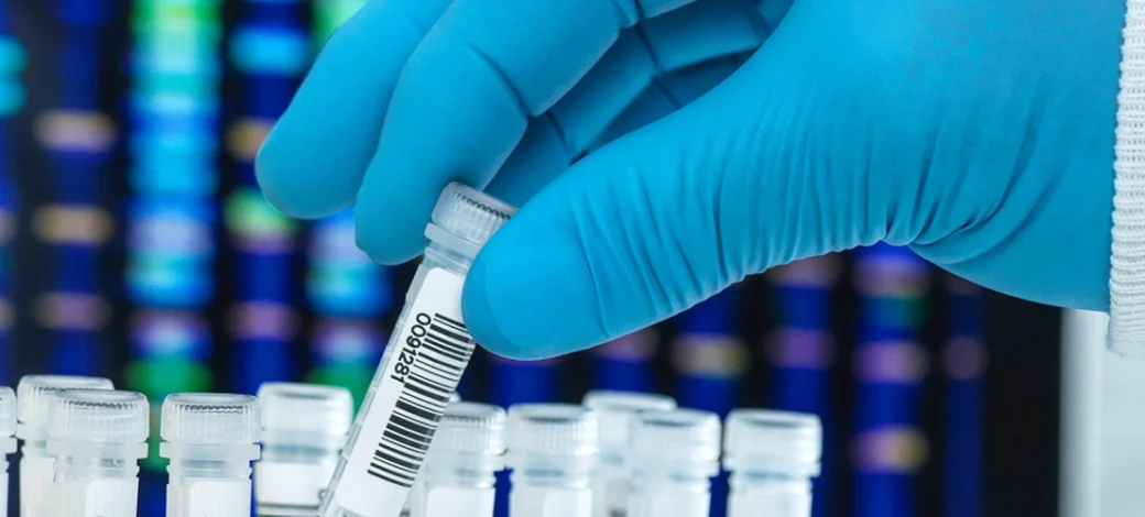 Lab technician doing expanded genetic testing.