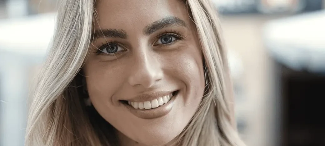 Egg donor smiling because she is happy to be an egg donor with Fairfax EggBank.