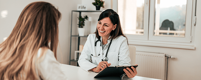 Woman Speaking to Doctor About Donating Eggs on Birth Control