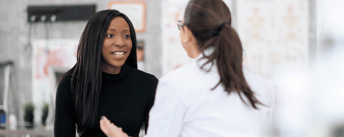 Woman Discussing Becoming an Egg Donor with Doctor