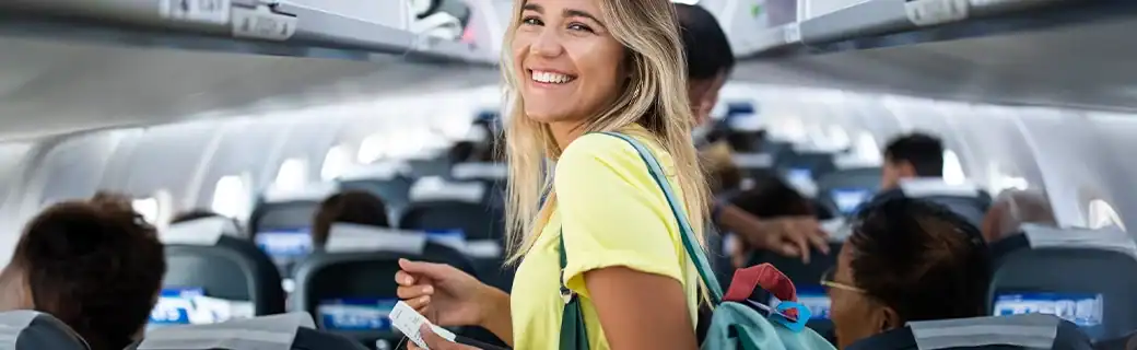 Travel egg donor on a plane traveling to her egg retrieval appointment