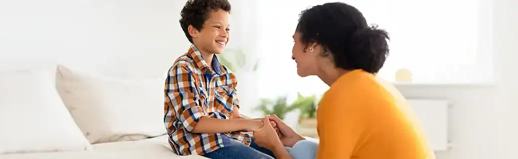 donor-conceived child talking with parent